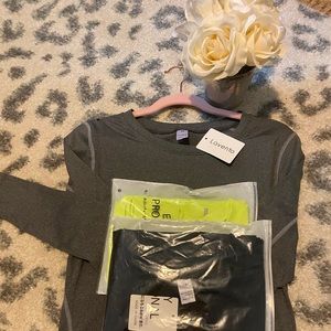 NWT pack of three work out shirts.